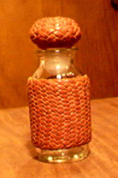 braided leather pineapple knot covered bottles