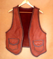  All of the hand braided leather vests that I build are also discussed at length with the customer. This includes what size, length, color/s, pocket types, yokes (front and/or back), and other features the customer requests. 